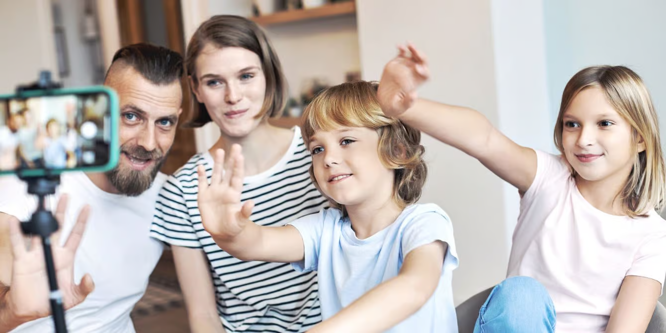 Family vlogger recording daily moments with kids and pets
