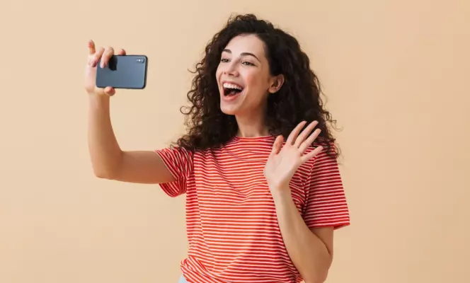 Vlogger recording the first video introduction at home
