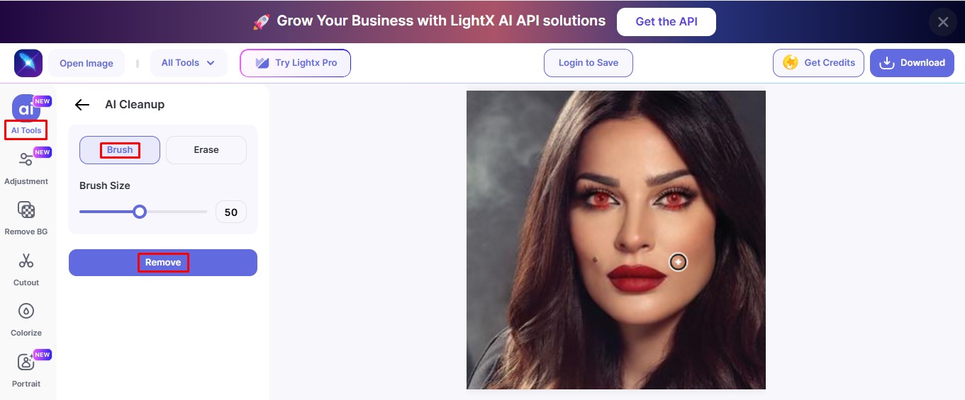 Usa las herramientas de LightX para arreglar los ojos rojos en línea