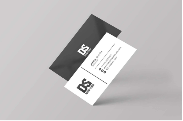Monochrome business card with bold black text on white