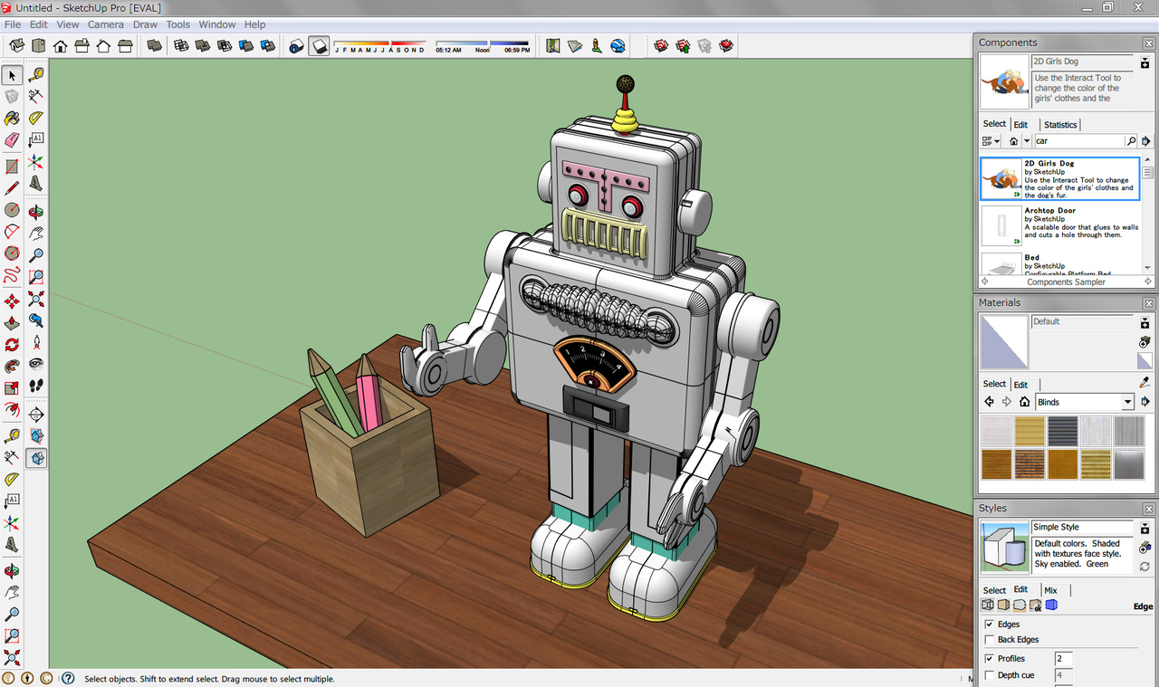 SketchUp 3D modeling interface with a robot model on a wooden table
