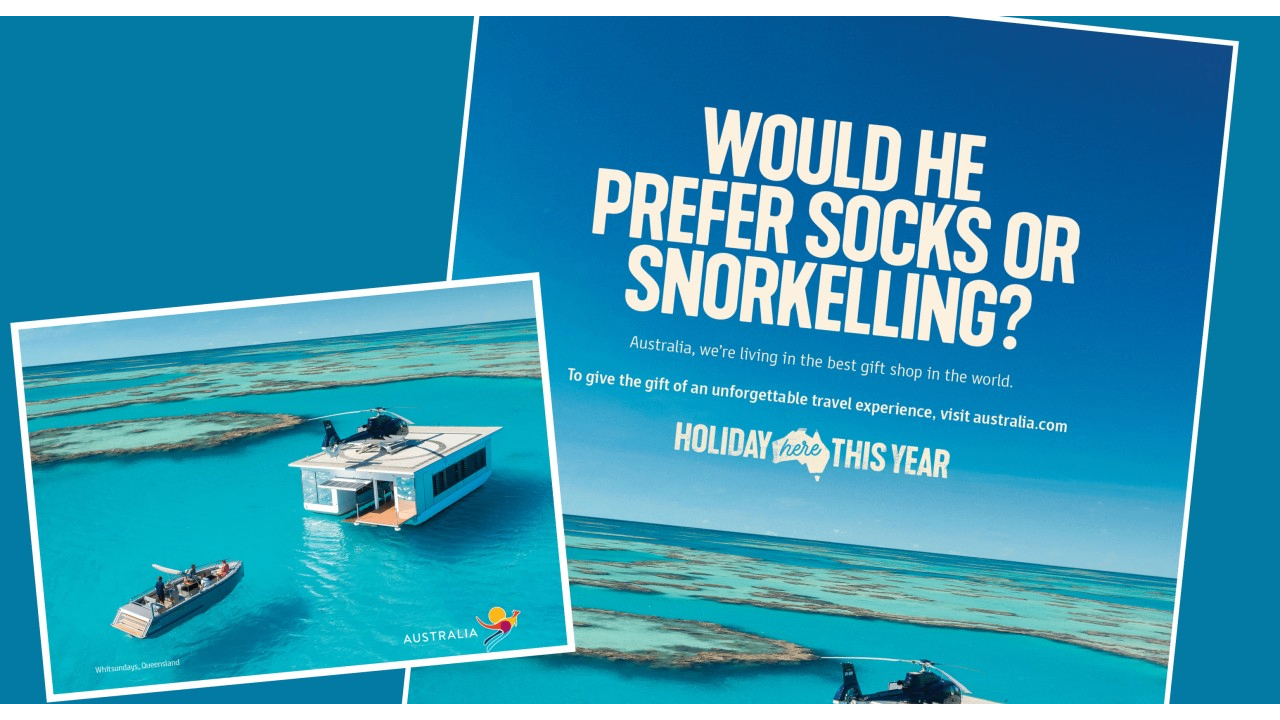 "Holiday Here This Year" campaign poster